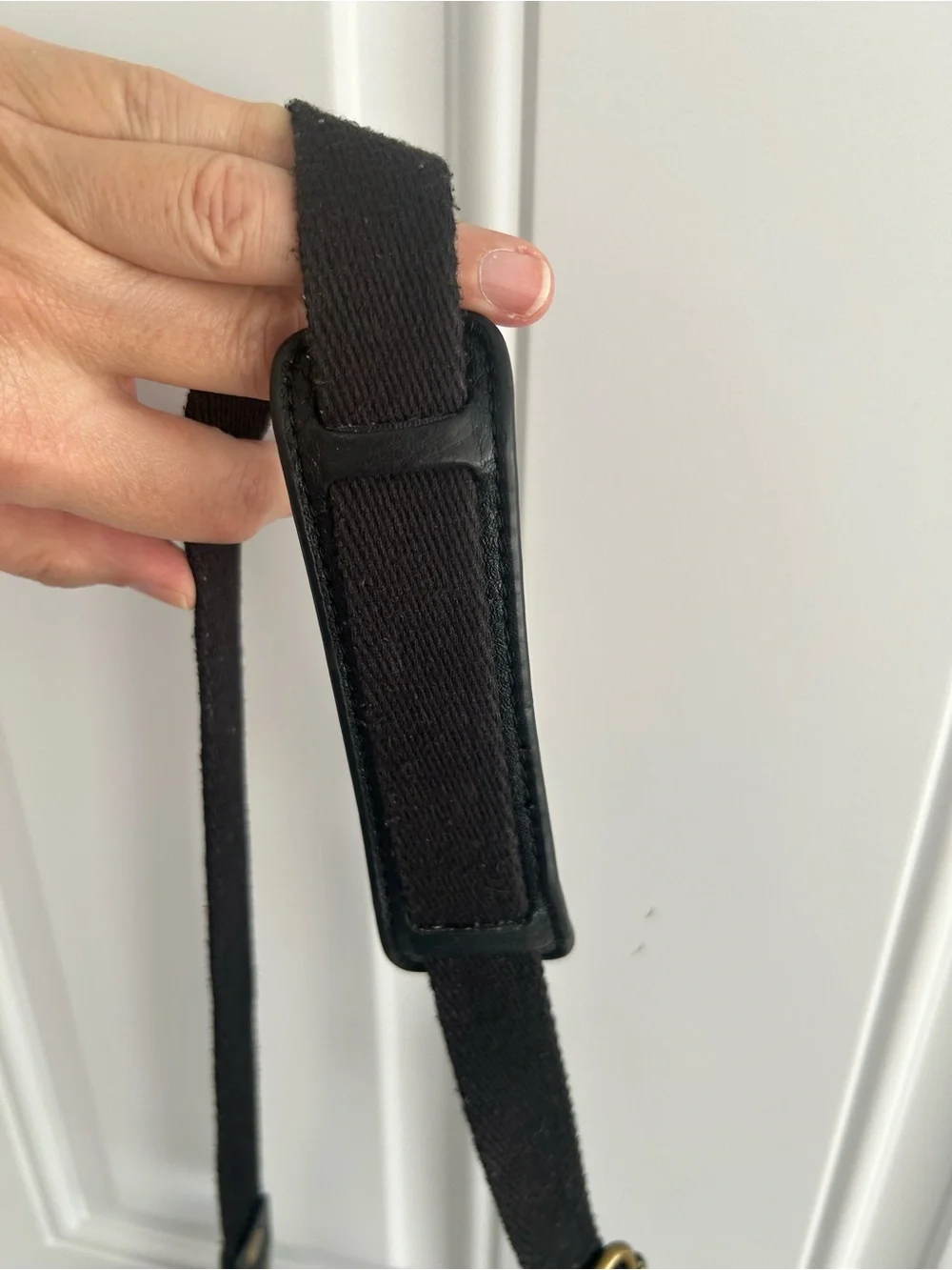 The Sac Iris Black Pebbled Leather Crossbody Bag Adjustable Strap Brass Hardware